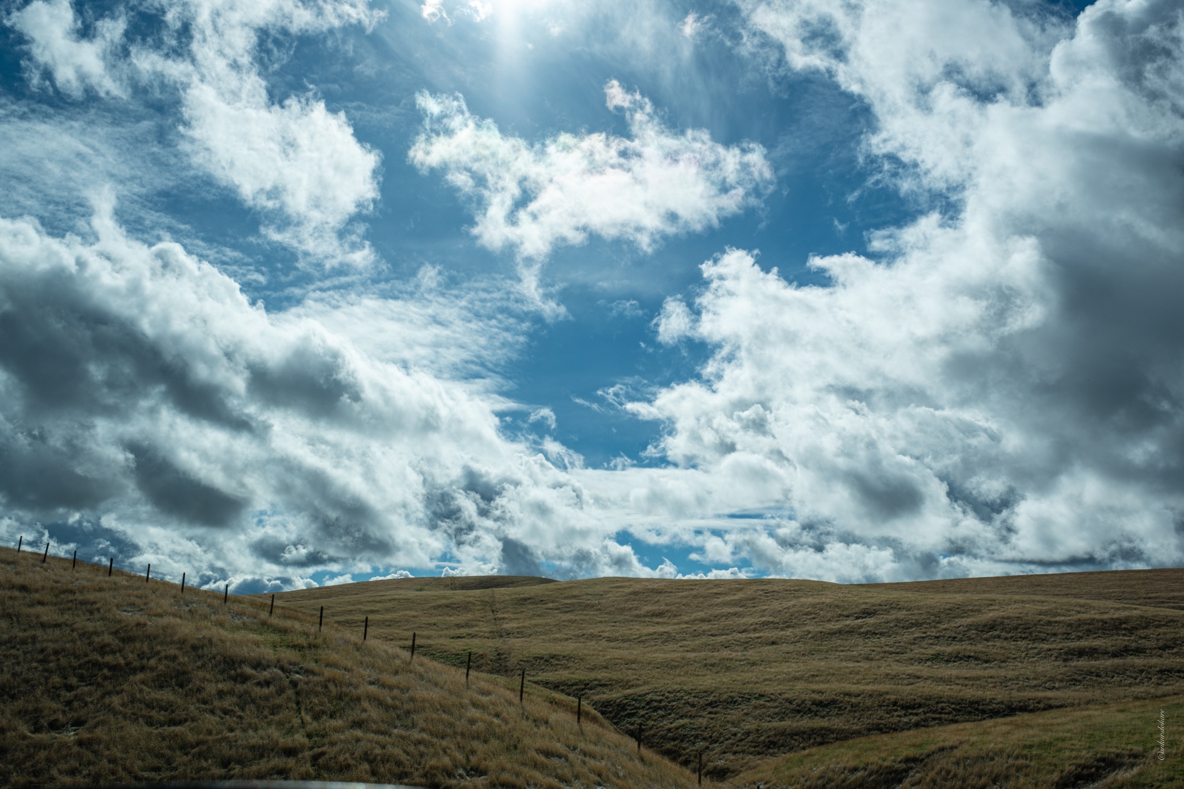Fence Line — Grassland Sky